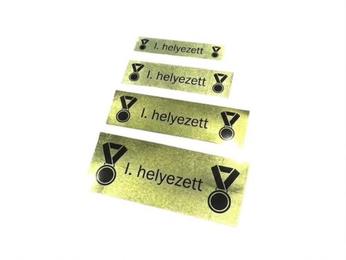Matrica /arany-fekete/ /téglalap alakú/ /éremre/ /24mm széles/